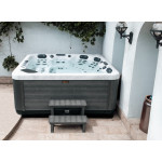 Wanna ogrodowa Jacuzzi z hydromasażem dla 6 osób LavaSpa 230x230cm 65 dysz 4 pompy system Balboa biały marmur obudowa szara